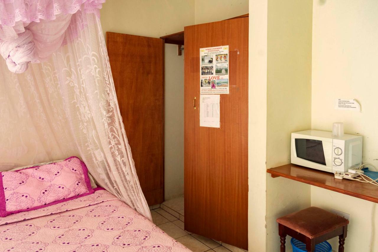 Sunrise Apartments Hotel Fort Portal Bagian luar foto