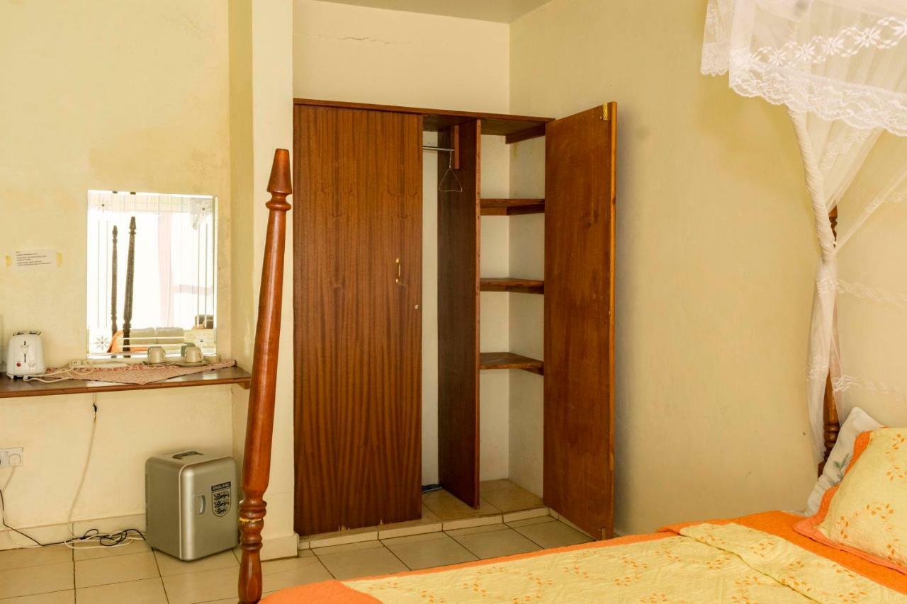 Sunrise Apartments Hotel Fort Portal Bagian luar foto